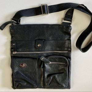 Crossbody. Genuine leather. Silver hardware.